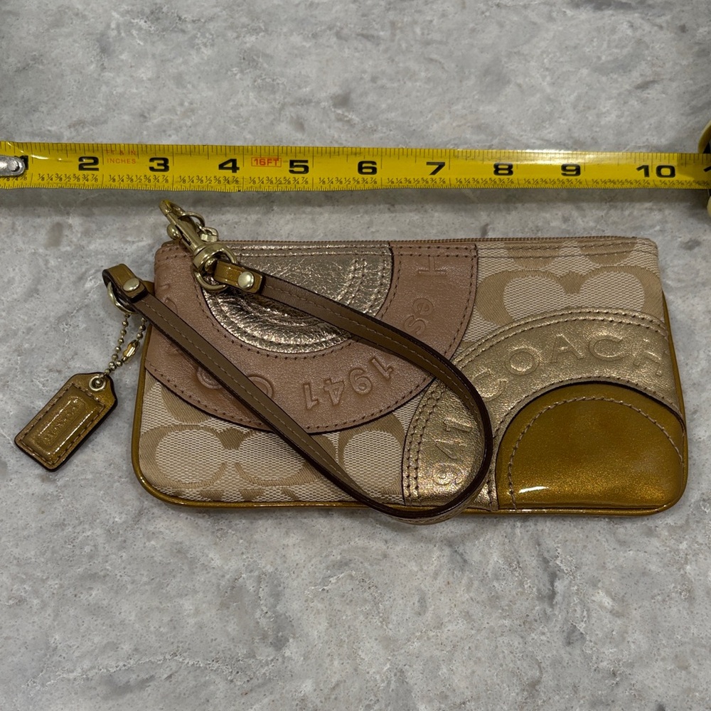 Coach Wristlet with Gold and Brown Accents